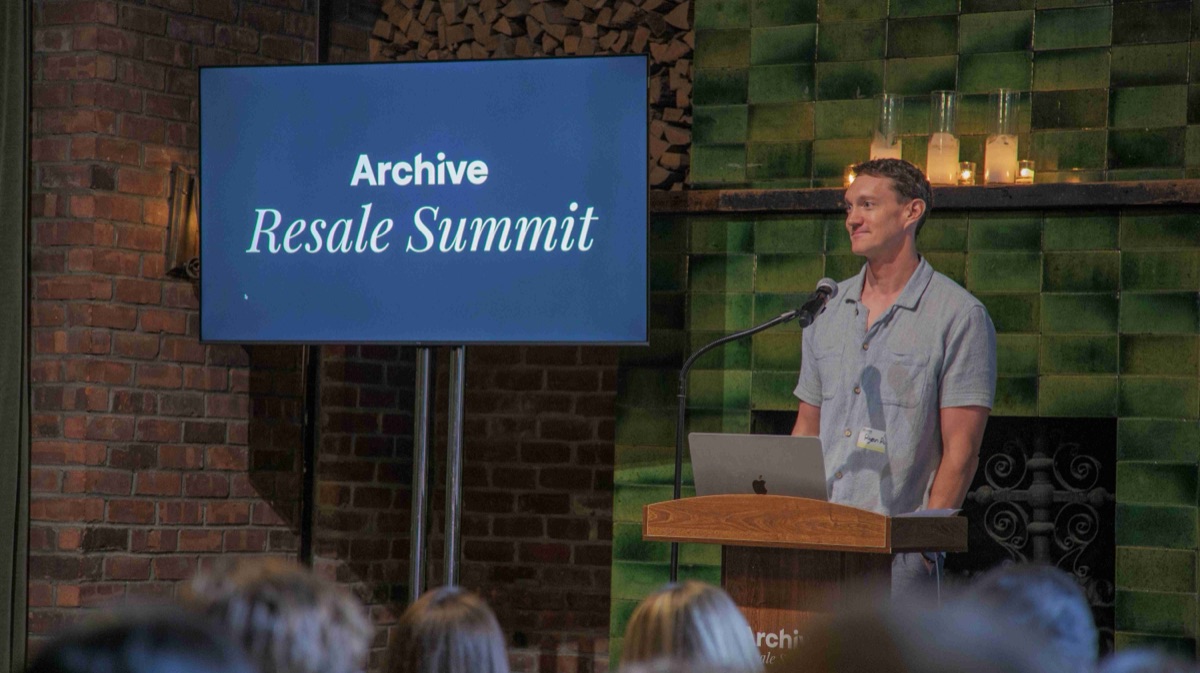 Archive's opening keynote on stage beneath the Resale Summit screen